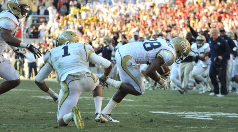 Georgia Tech excelled at takeaways, notably cornerback D.J. White’s game-clinching interception against Georgia, but needs to improve overall for the Yellow Jackets to succeed again. (AJC photo by Hyosub Shin)