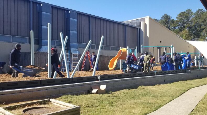 More than 150 volunteers helped install a kid-designed playground at the J.M. Tull-Gwinnett Family YMCA in Lawrenceville. COURTESY YMCA OF METRO ATLANTA