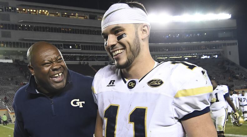 Quarterback Matthew Jordan #11 of the Georgia Tech Yellow Jackets speaks with team chaplain Derrick Moore following the victory against the Virginia Tech Hokies at Lane Stadium on November 12, 2016 in Blacksburg, Virginia. Georgia Tech defeated Virginia Tech 30-20. (Photo by Michael Shroyer/Getty Images)