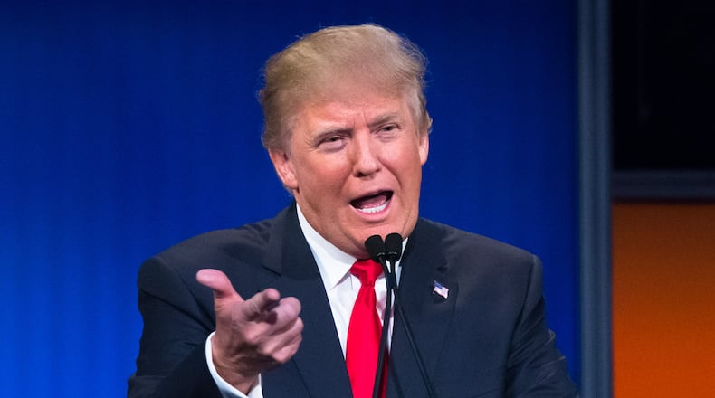 Republican presidential candidate Donald Trump participates in the first Republican presidential debate at the Quicken Loans Arena Thursday, Aug. 6, 2015, in Cleveland. (AP Photo/John Minchillo)