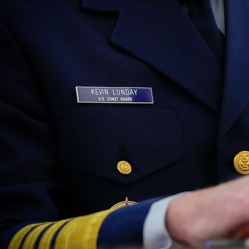 The name tag and ribbons of Adm. Kevin Lunday, acting commandant of the U.S. Coast Guard, are visible as he speaks during a Senate Commerce, Science and Transportation Committee hearing on his nomination for Commandant of the Coast Guard, Wednesday, Nov. 19, 2025, on Capitol Hill in Washington. (AP Photo/Julia Demaree Nikhinson)