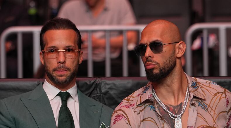 FILE - Andrew Tate, right, and his brother Tristan arrive an event, April 11, 2026, in Miami. (AP Photo/Julia Demaree Nikhinson, Pool, File)
