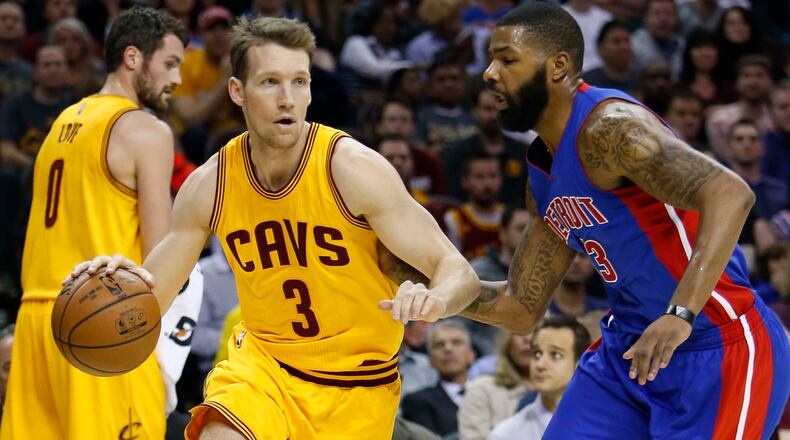 Cleveland Cavaliers’ Mike Dunleavy (3) drives around Detroit Pistons’ Marcus Morris (13) during the first half of an NBA basketball game in Cleveland. (AP Photo/Ron Schwane, File)