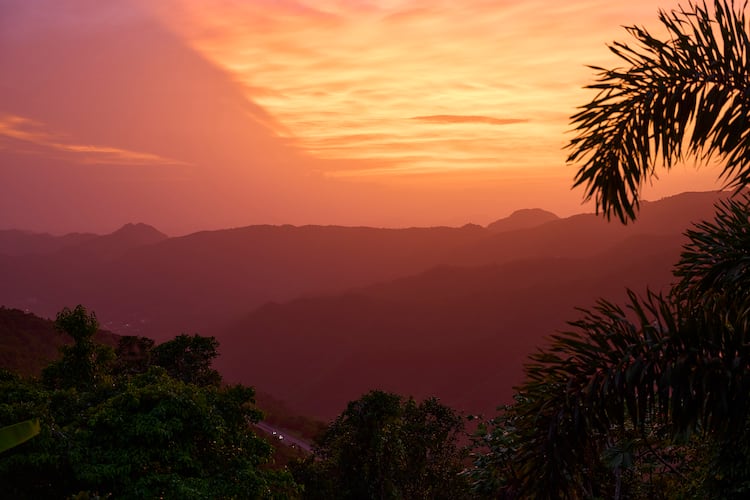 A sunset over the mountains in Puerto Rico.