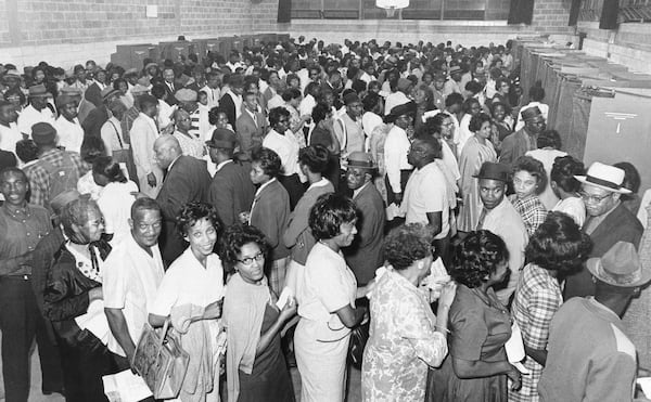 An estimated 1,000 Black voters wait in line to cast ballots in the Democratic primary in Birmingham, Ala., in May 1966, the first major Southern election after the 1965 federal Voting Rights Act was passed. (AP file)