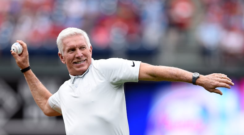 Former Philadelphia Phillies third baseman Mike Schmidt throws out the ceremonial first pitch before a baseball game against the Cincinnati Reds, Sunday, May 28, 2017, in Philadelphia. (AP Photo/Michael Perez)