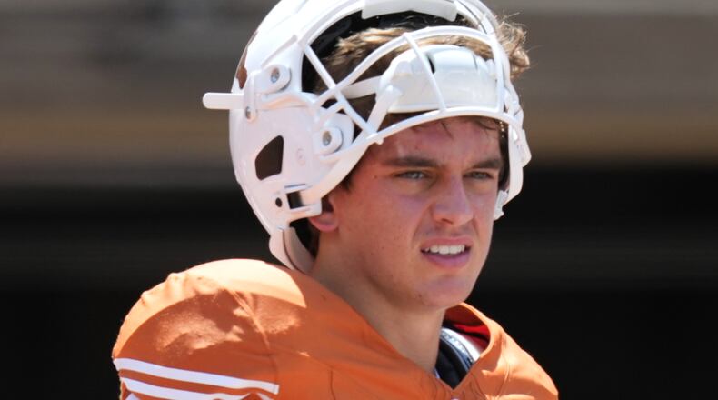 Texas quarterback Arch Manning warms up before an NCAA college football game against Texas State in Austin, Texas, Saturday, Sept. 5, 2026. (AP Photo/Eric Gay)