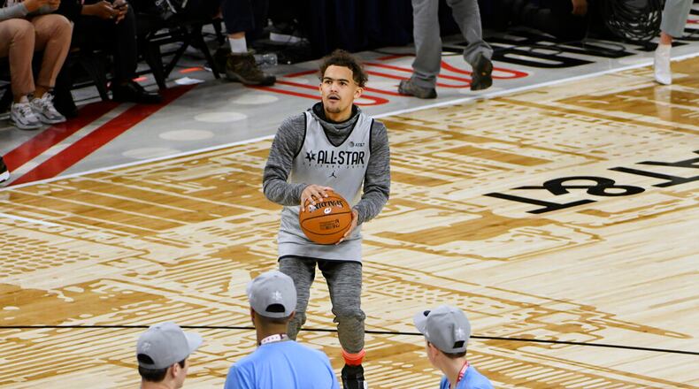 Trae Young of the Atlanta Hawks warms up during practice earlier Saturday, Feb. 15, 2020, in Chicago. (AP Photo/David Banks)