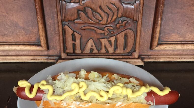 Get a hot dog with toppings for $2 and stay for trivia night at Hand in Hand.