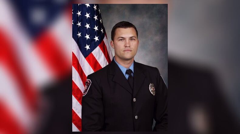 Coweta County fire Lt. Adam Moss is recovering after a tree limb fell on him Sunday. (Credit: Channel 2 Action News)