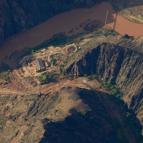 Flood debris lines Bright Angel Canyon near where it meets the Colorado River in the Grand Canyon, Monday, Aug. 31, 2026, at Grand Canyon National Park, Ariz. (AP Photo/John Locher)