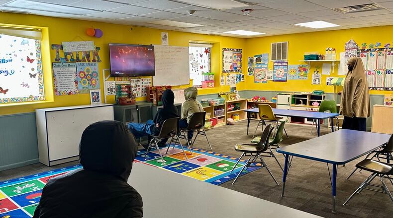 FILE - Children watch television at ABC Learning Center in Minneapolis, Minn., Dec. 31, 2025. (AP Photo/Mark Vancleave, File)