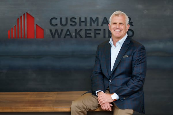 Gregg Metcalf, who recently assumed the role of executive director at Cushman & Wakefield, is photographed at the company’s Midtown office on Tuesday, March 3, 2026. (Miguel Martinez/AJC)
