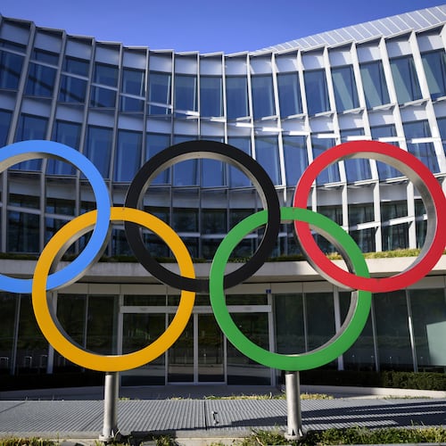 FILE -Olympic Rings are pictured in front of The Olympic House, headquarters of the International Olympic Committee (IOC) at the opening of the executive board meeting of the International Olympic Committee (IOC) in Lausanne, Switzerland, March 28, 2023. (Laurent Gillieron/Keystone via AP, File)