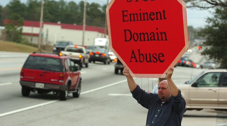 In 2006, activists took to the streets to lobby for eminent domain reform following a Supreme Court decision allowing governments to seize property for economic development. Those reforms passed in Georgia, but a bill in the Legislature erodes some of those protections. FILE PHOTO