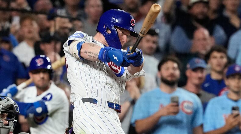 Chicago Cubs' Pete Crow-Armstrong hits a single to complete the cycle during the seventh inning of a baseball game against the Colorado Rockies in Chicago, Monday, June 15, 2026. (AP Photo/Nam Y. Huh)