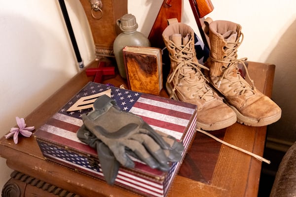 The parts of Army Reserve Sgt. Kennedy L. Sanders keep items from her late daughter at their home in Waycross. (Arvin Temkar/AJC)