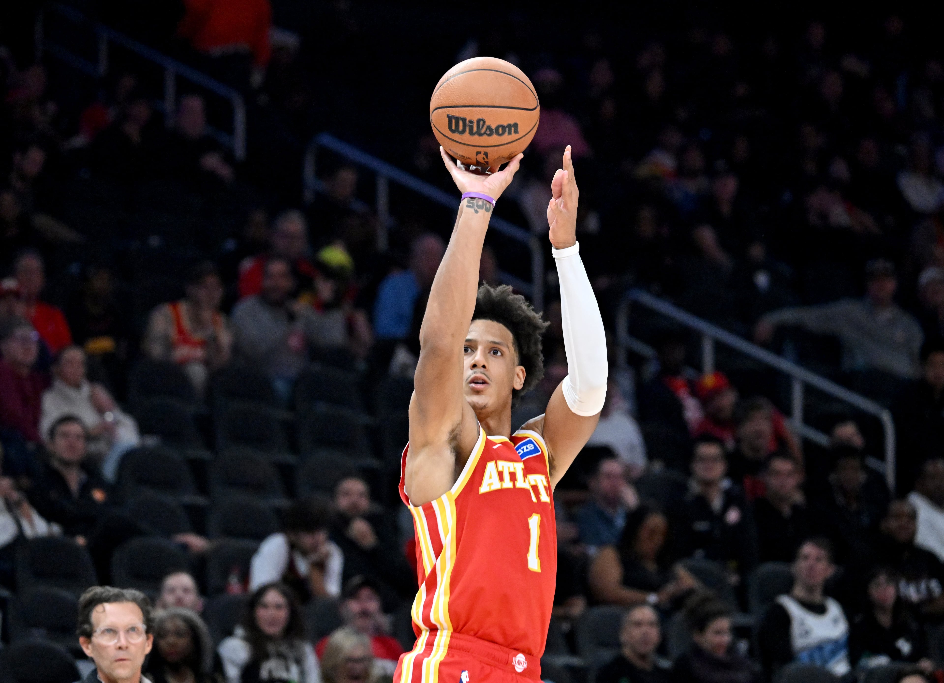 Atlanta Hawks forward Jalen Johnson (1) gets off a shot during the second half in the home opener at State Farm Arena, Thursday, October 22, 2025, in Atlanta. Toronto Raptors won 138-118 over Atlanta Hawks. (Hyosub Shin / AJC)