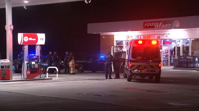 A Fulton County police officer shot at a man wielding a machete, police said.