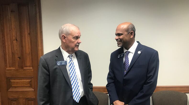 State Sen. Lindsey Tippins, R-Marietta, and Sen. Sheikh Rahman, D-Lawrenceville, discuss Rahman’s legislation that would allow some Georgia college students to get loans if they agree to pay them back with a portion of their future earnings. ERIC STIRGUS / ESTIRGUS@AJC.COM