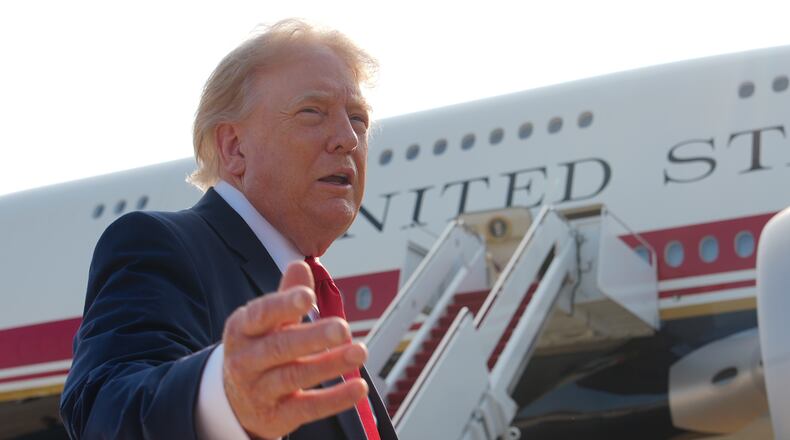 President Donald Trump speaks to reporters before boarding Air Force One, Wednesday, July 1, 2026, at Joint Base Andrews, Md. (AP Photo/Julia Demaree Nikhinson)