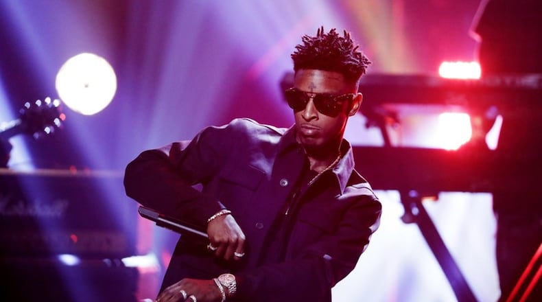 Atlanta rapper 21 Savage will serve food to members of the community on Tuesday.