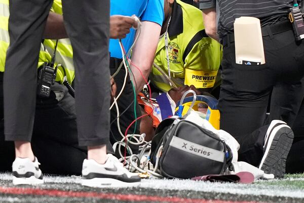 Medical personnel aid Detroit Lions safety Morice Norris after he was injured on Friday, Aug. 8, 2025, in Atlanta. (Brynn Anderson/AP)