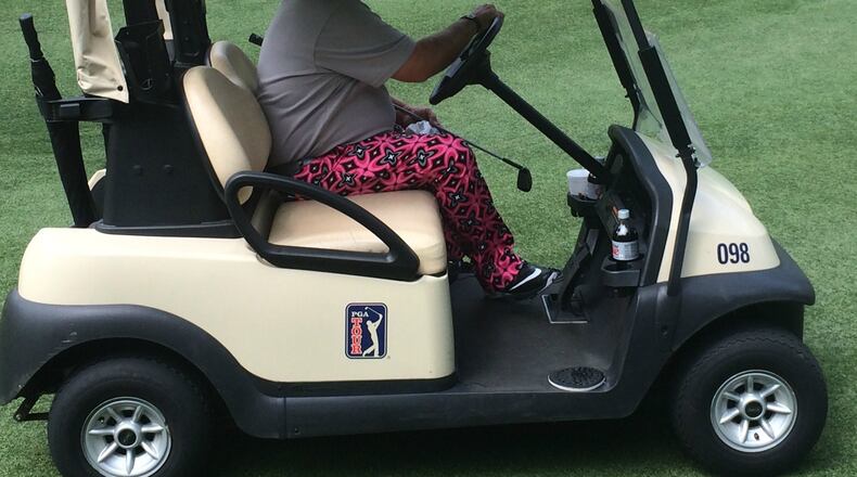 Who is that man in the, um, interesting pants driving off at the Mitsubishi Electric Classic? It's John Daly, of course. (Steve Hummer)