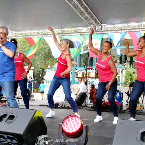 When Julian Meija (pictured in blue), founder of SALSAtlanta, first moved to Atlanta in the 1990s, he found no one was dancing casino as they had been in Miami. He introduced Atlantans to the Cuban form and has been teaching it ever since. (Courtesy of Julian Mejia Photography)
