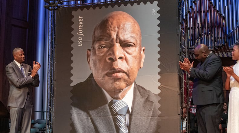 The US Postal Office has issued a commemorative forever stamp in honor of Congressman John Lewis. The new stamp is unveiled during the first day of issue dedication ceremony takes place at Morehouse on Friday, July 21, 2023. (Jenni Girtman for The Atlanta Journal-Constitution)