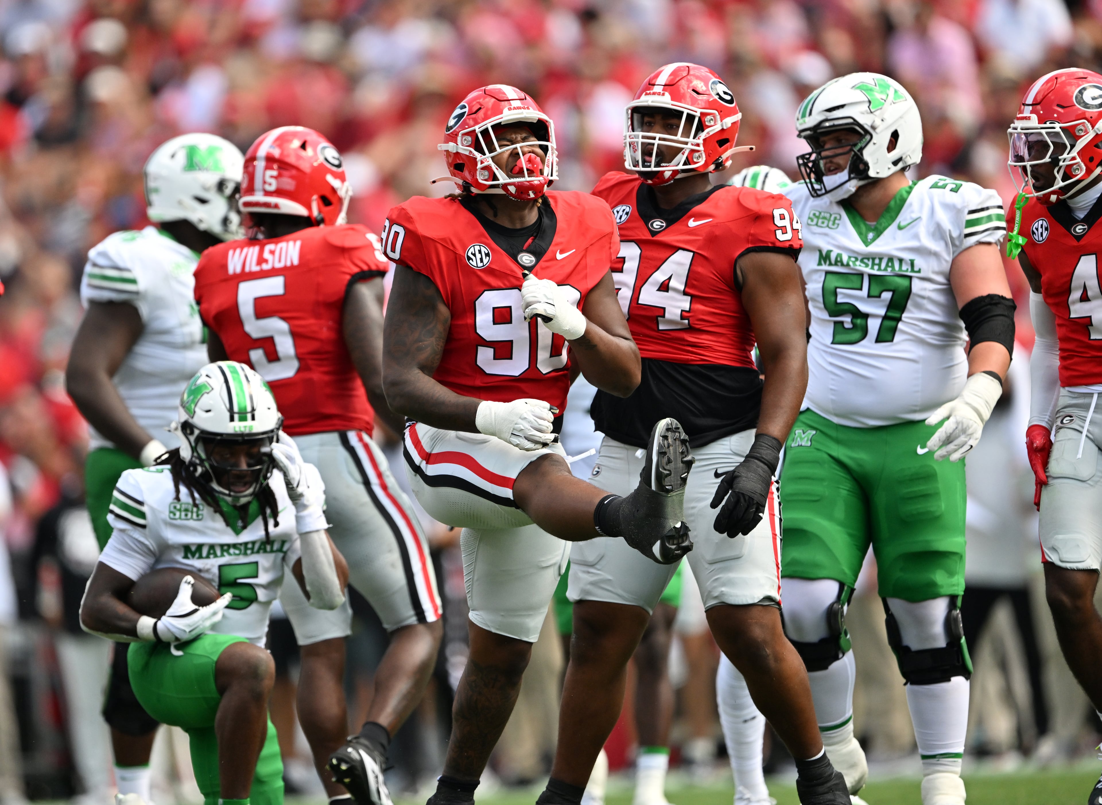 Georgia defensive lineman Elijah Griffin (90) reacts after tackling during the first half in an NCAA football game at Sanford Stadium, Saturday, August 30, 2025, in Athens. (Hyosub Shin / AJC)