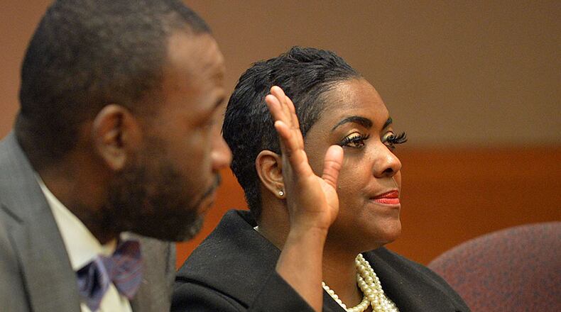 Lera Middlebrooks sits with her defense attorney Wesley Person during Wednesday's plea hearing. Middlebrooks, former testing coordinator at Dunbar Elementary, plead guilty to obstruction charges and was sentenced to 12 months probation and 250 hours of community service by Judge Baxter.