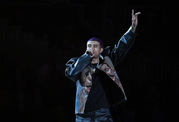 Kap G performs during an NBA basketball game at State Farm Arena in March. (Hyosub Shin/AJC)