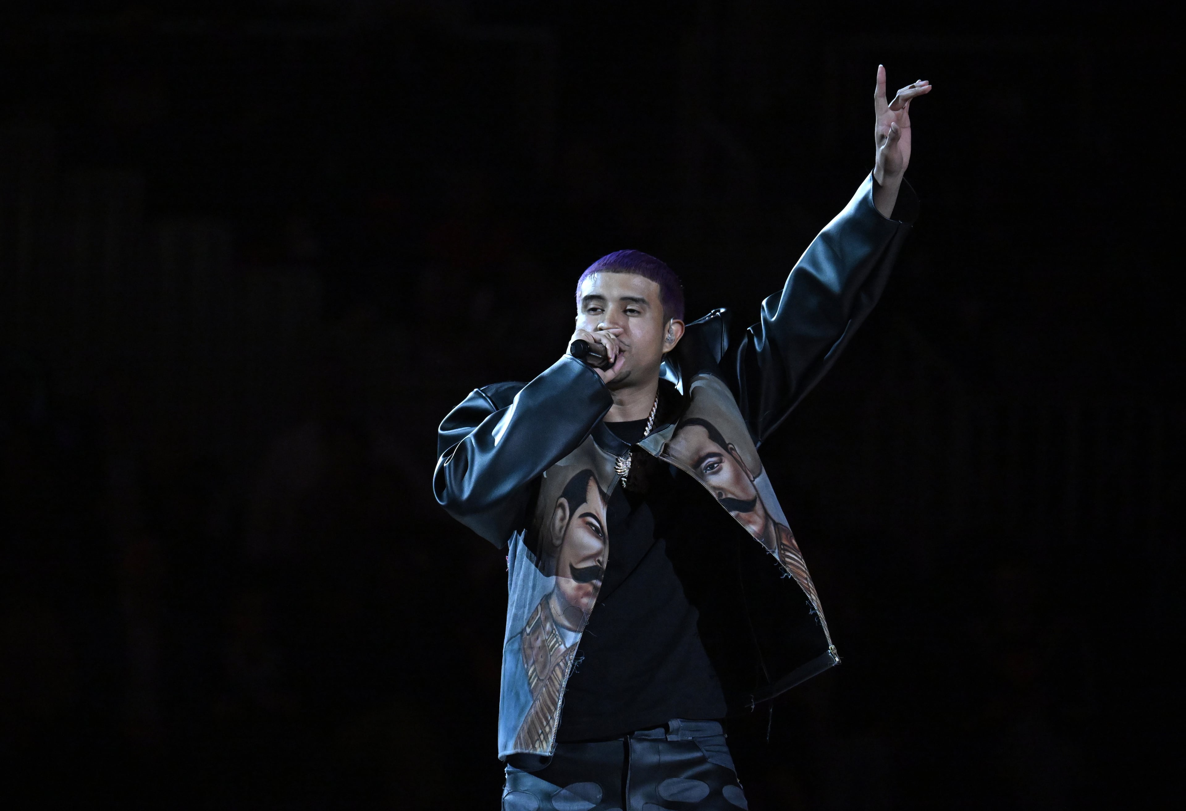 Kap G performs during an NBA basketball game at State Farm Arena in March. (Hyosub Shin/AJC)