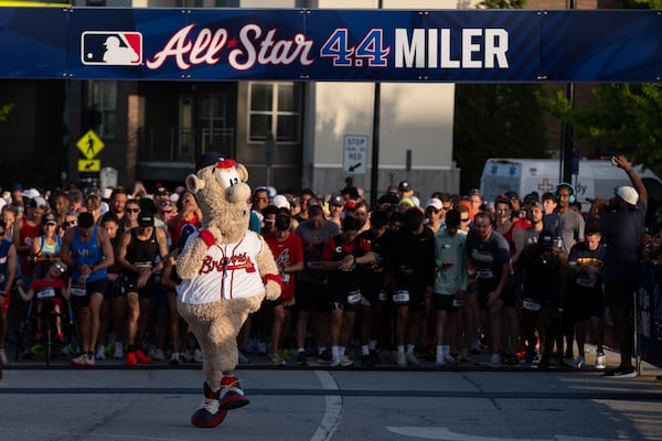Braves mascot Blooper jumps the gun at Sunday's All-Star 4.4 Miler in Summerhill. 