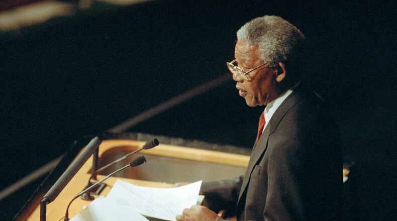 FILE - Nelson Mandela, anti-apartheid leader and president of the African National Congress, addresses the United Nations General Assembly in New York, Dec. 3, 1991. (AP Photo/Ed Bailey, File)