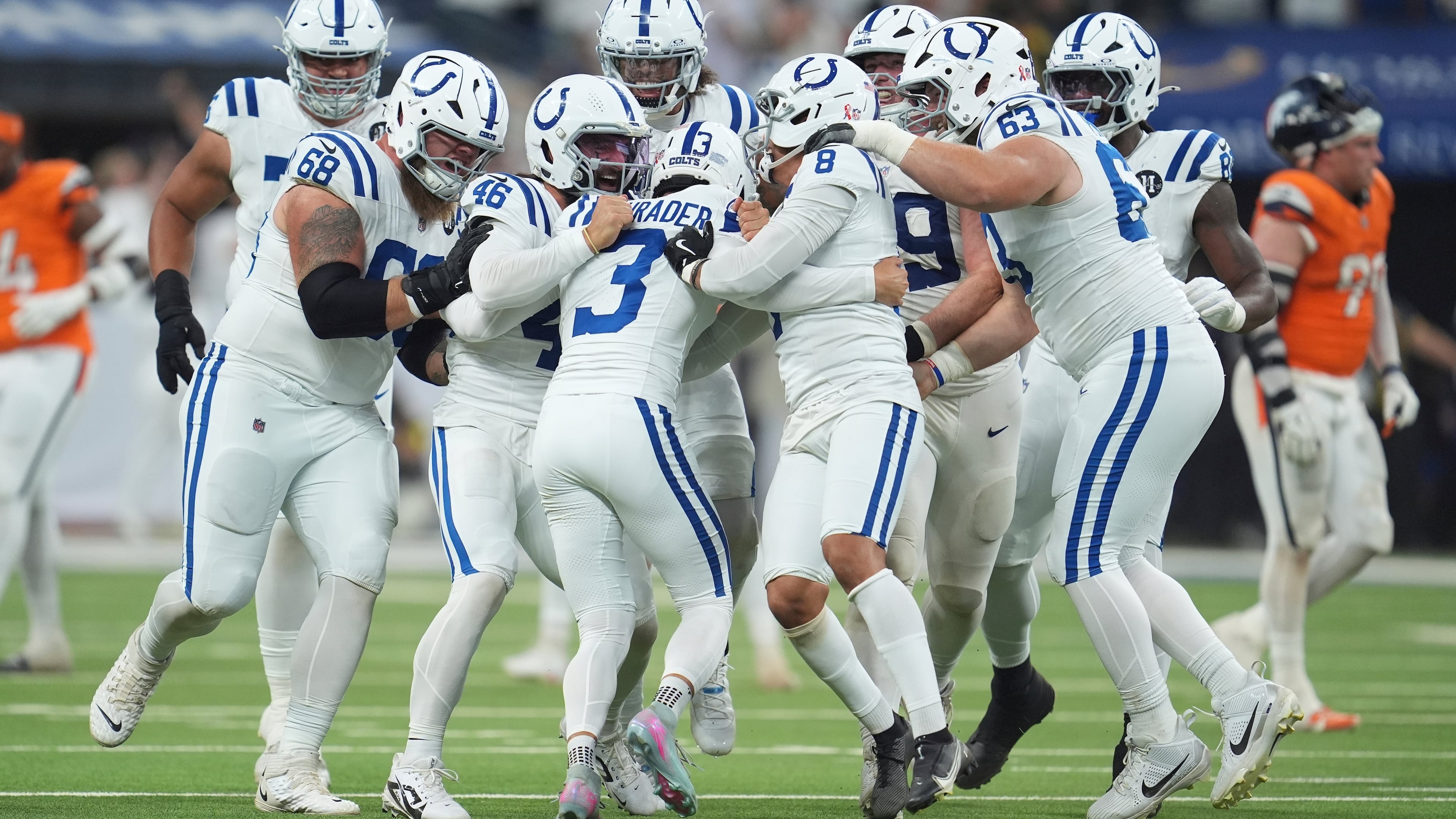 Indianapolis Colts place kicker Spencer Shrader (3) celebrates with teammates after kicking the game winning field goal during the second half an NFL football game against the Denver Broncos, Sunday, Sept. 14, 2025, in Indianapolis. (AP Photo/Michael Conroy)