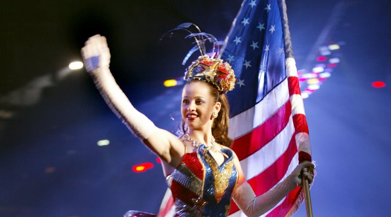 060212 - ATLANTA, GA -- Nadia Dascal (cq) greets guests early in the Ringling Brothers and Barnum and Bailey Circus' bilingual performance with announcements and songs in both English and Spanish at Philips Arena on Sunday, Feb. 12, 2006. Approximately 40 percent of the show is in Spanish. (JENNI GIRTMAN/AJC STAFF) Nadia Dascal rides an elephant during a 2006 performance by the Ringling Brothers Barnum & Bailey Circus in Atlanta.