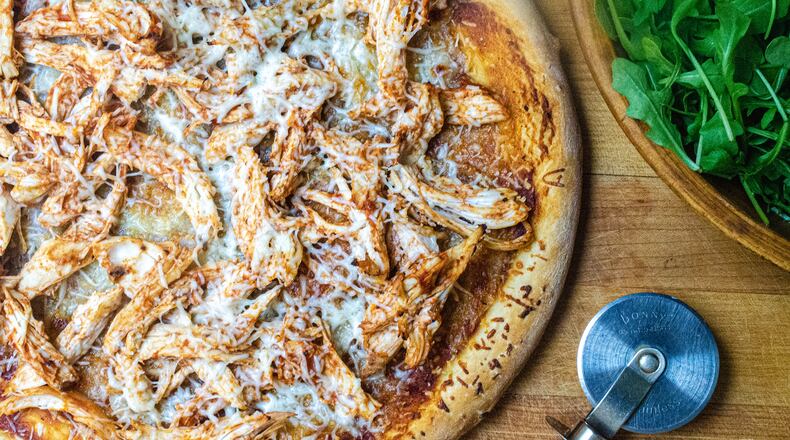 Barbecue Chicken Pizza with an arugula side salad.
(Virginia Willis for The Atlanta Journal-Constitution)