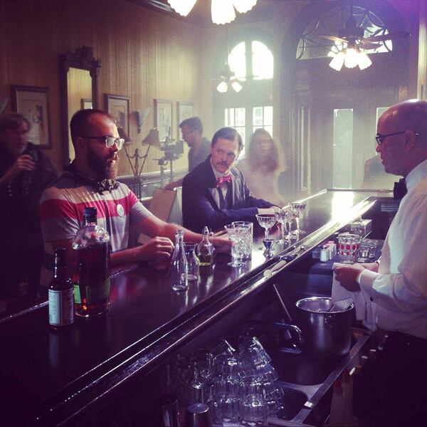  Director James Martin discusses a scene with bartender Chris Hannah at Arnaud's French 75 Bar. Photo courtesy of Four x Productions
