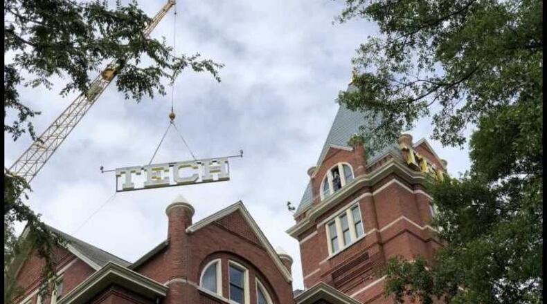 A crane lifts the new "TECH" sign that has been placed on the tower on Georgia Tech's campus. Photo Credit: Georgia Tech