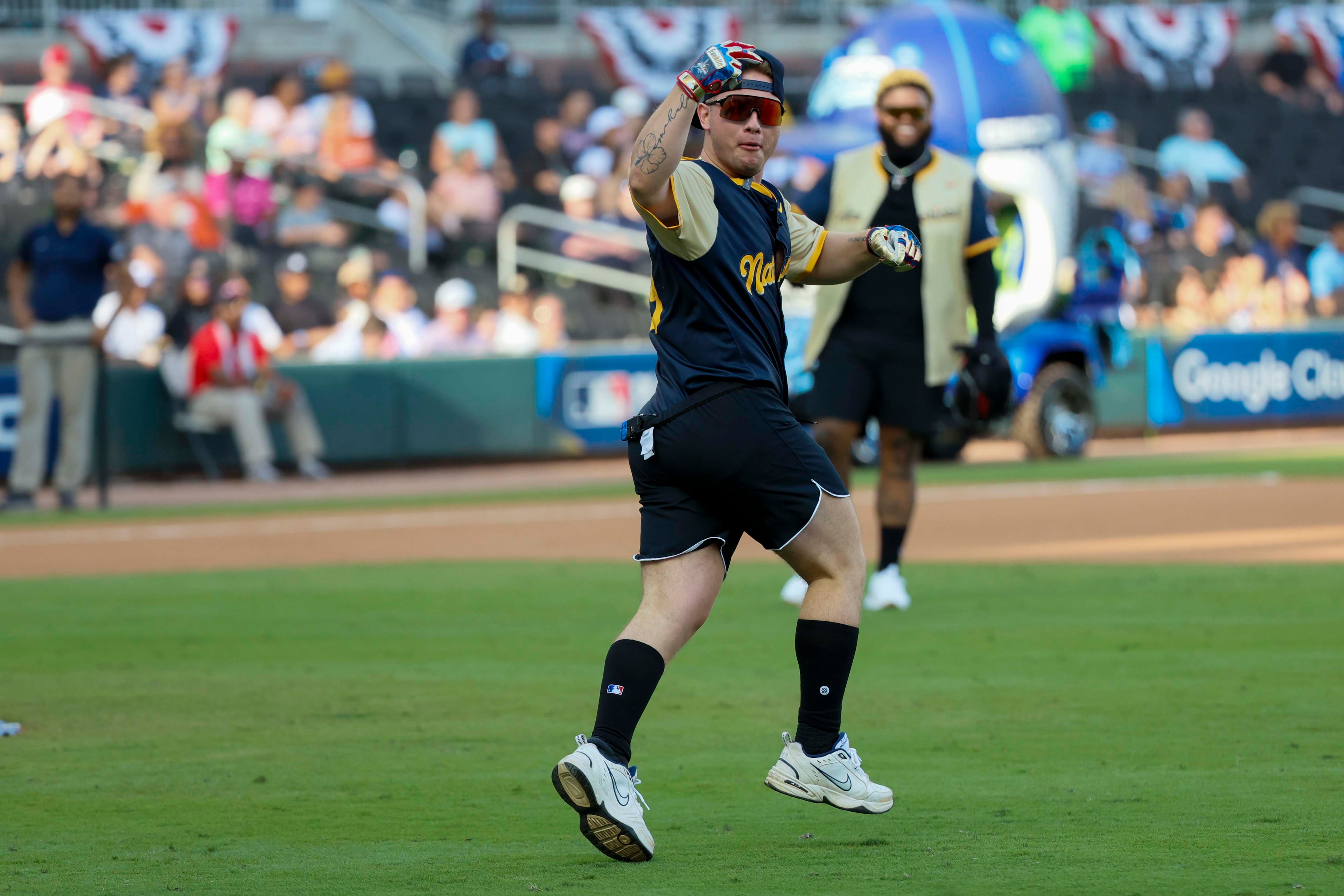 Influencer Nicky Cass reacts after hitting a home run
during the MLB All-Star Celebrity Game at Truist Park on Saturday, July 12, 2025, in Atlanta.
(Miguel Martinez/ AJC)