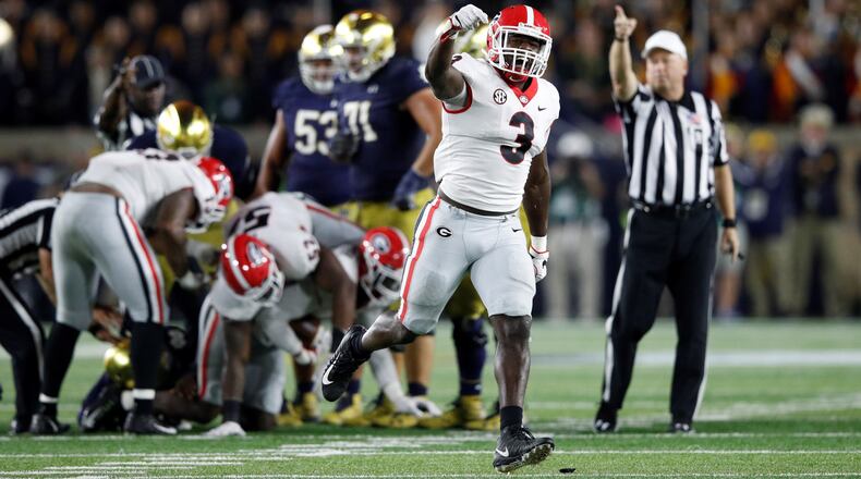 Roquan Smith of the Georgia Bulldogs celebrates after a fumble recovery by a teammate in the fourth quarter of a game against the Notre Dame Fighting Irish at Notre Dame Stadium on September 9, 2017 in South Bend, Indiana. Georgia won 20-19. (Photo by Joe Robbins/Getty Images)
