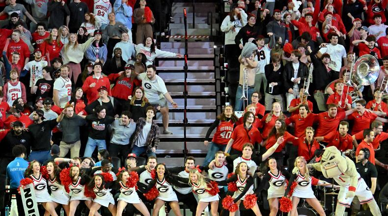 Georgia fans cheer at the end of the second half of an NCAA college basketball game at Stegeman Coliseum, Wednesday, January 24, 2024, in Athens. Georgia won 68-66 over LSU. (Hyosub Shin / Hyosub.Shin@ajc.com)