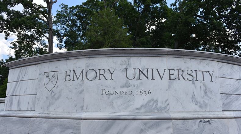 The main sign leading to Emory University’s campus in Atlanta’s Druid Hills neighborhood. HYOSUB SHIN / HSHIN@AJC.COM