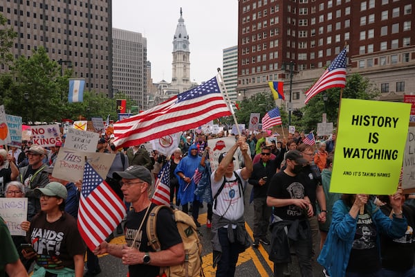 Demonstrators march during the "No Kings" protest, Saturday, June 14, 2025, in Philadelphia. (AP Photo/Yuki Iwamura)