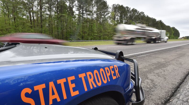 Sgt. Maurice Raines, post commander of Georgia State Patrol Post 2, sits in his car monitoring I-85 in LaGrange on a weekday in April. HYOSUB SHIN / HSHIN@AJC.COM
