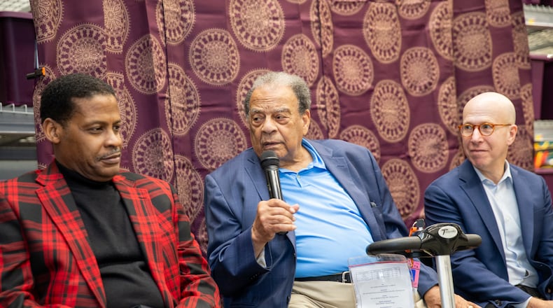Stockbridge Walmart hosts a book signing and panel discussion on Saturday, Aug 19, 2023, where MLK family including King’s nephew Isaac Farris Jr, from left, Ambassador Andrew Young and “King: A Life” author Jonathan Eig, discuss the new book and their own memories of Stockbridge and the stories of Daddy King and the family.  This Walmart location was once a cotton field where King’s father was a sharecrop farmer.  (Jenni Girtman for The Atlanta Journal-Constitution)