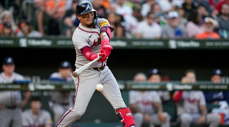 Atlanta Braves' Orlando Arcia hits a single against the Baltimore Orioles during the fifth inning of a baseball game, Tuesday, June 11, 2024, in Baltimore. (AP Photo/Jess Rapfogel)