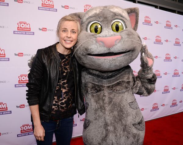 Comedian Maria Bamford (left) and Talking Tom attend the premiere screening of the "Talking Tom and Friends" animated series at YouTube Space LA on Thursday, April 30, 2015, in Los Angeles. The series debuts today on YouTube. (Dan Steinberg/AP)